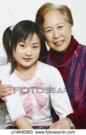 Stock Image - Portrait of a mother and her daughter. Fotosearch