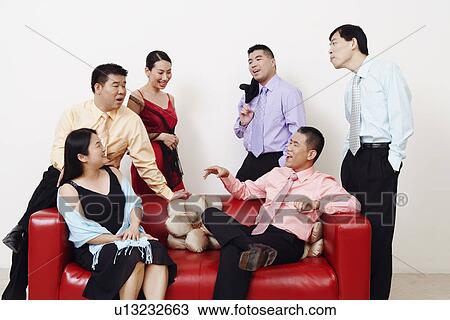Group of business executives talking View Large Photo Image Stock Image - Group of business executives talking. Fotosearch