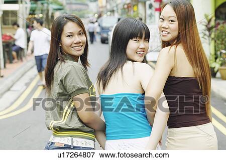 Portrait of three young women smiling View Large Photo Image Stock Photo - Portrait of three young women smiling. Fotosearch