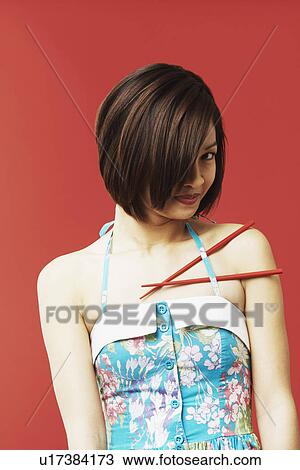 Portrait of a young woman smiling View Large Photo Image Stock Image - Portrait of a young woman smiling. Fotosearch