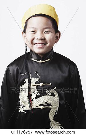 Close-up of a boy smiling View Large Photo Image Stock Photo - Close-up of a boy smiling. Fotosearch