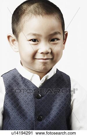 Stock Image - Portrait of a boy smiling. Fotosearch
