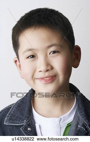 Portrait of a boy smiling View Large Photo Image Stock Image - Portrait of a boy smiling. Fotosearch