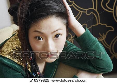 Stock Photography - Close-up of a teenage girl. Fotosearch