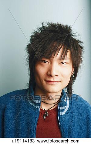 Portrait of a young man smiling View Large Photo Image Stock Image - Portrait of a young man smiling. Fotosearch