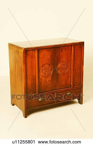 Stock Image - Close-up of a wooden cabinet. Fotosearch