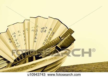 Close-up of folding fans in a basket View Large Photo Image Stock Image - Close-up of folding fans in a basket. Fotosearch