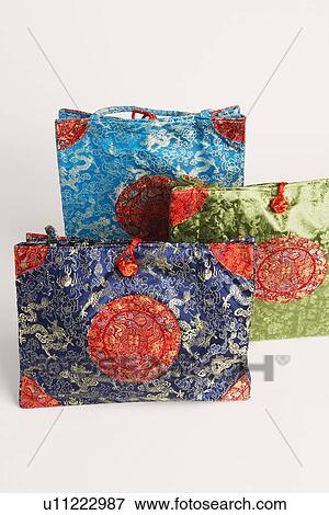 Close-up of three hand bags View Large Photo Image Stock Photo - Close-up of three hand bags. Fotosearch