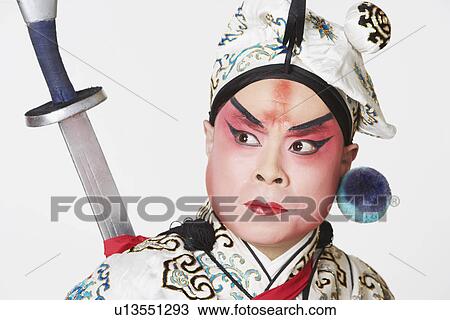 Close-up of a mature man wearing traditional clothing View Large Photo Image Stock Image - Close-up of a mature man wearing traditional clothing. Fotosearch