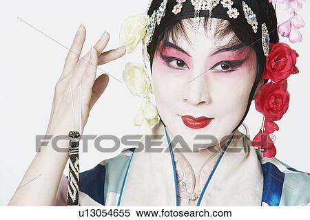 Stock Photography - Close-up of a mature woman wearing traditional clothing. Fotosearch