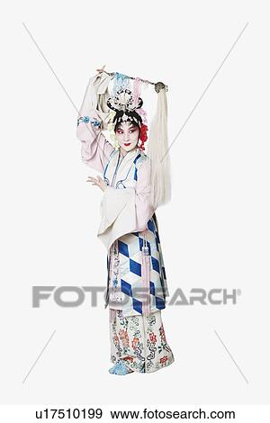 Stock Photo - Mature woman wearing traditional clothing. Fotosearch