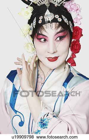 Stock Photo - Mature woman wearing traditional clothing. Fotosearch
