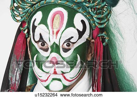 Picture - Portrait of a male Chinese opera performer looking serious. Fotosearch