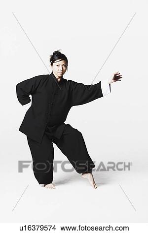 Picture - Portrait of a young woman practicing martial arts. Fotosearch