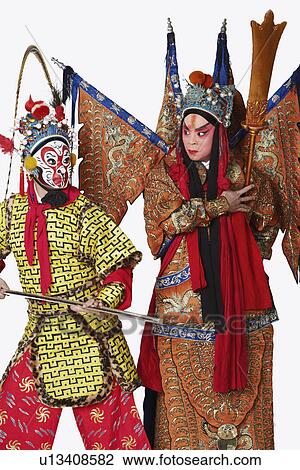Two male Chinese opera performers gesturing with weapons View Large Photo Image Stock Image - Two male Chinese opera performers gesturing with weapons. Fotosearch