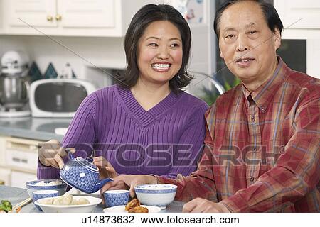 Close-up of a father and his daughter View Large Photo Image Stock Image - Close-up of a father and his daughter. Fotosearch