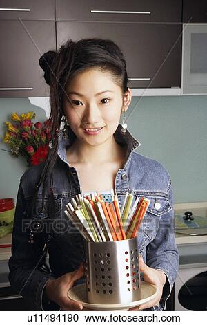 Portrait of a teenage girl smiling View Large Photo Image Stock Image - Portrait of a teenage girl smiling. Fotosearch