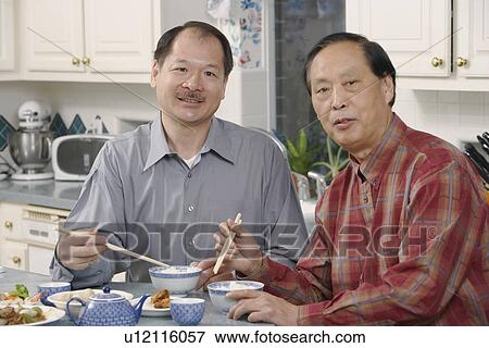 Portrait of two senior men at the table View Large Photo Image Stock Photo - Portrait of two senior men at the table. Fotosearch