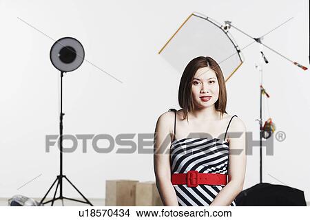 Picture - Portrait of a young woman smiling. Fotosearch