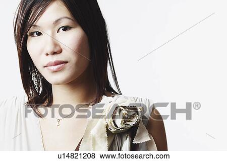 Stock Photo - Portrait of a young woman. Fotosearch