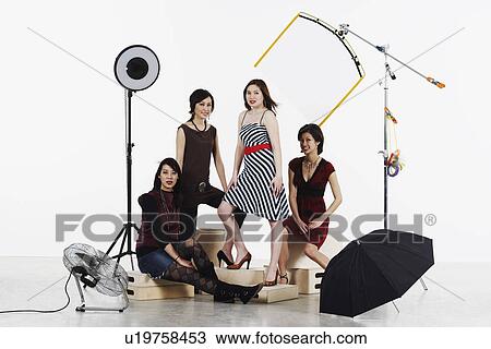 Portrait of four young women smiling View Large Photo Image Stock Image - Portrait of four young women smiling. Fotosearch
