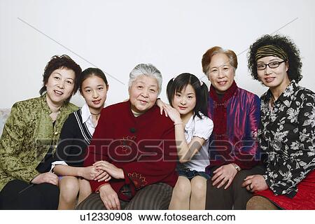 Stock Photo - Portrait of a family. Fotosearch