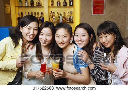 Portrait of three teenage girls and two young women holding drinks View Large Photo Image Stock Image - Portrait of three teenage girls and two young women holding drinks. Fotosearch