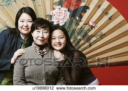Portrait of a grandmother with her daughter and granddaughter View Large Photo Image Stock Image - Portrait of a grandmother with her daughter and granddaughter. Fotosearch