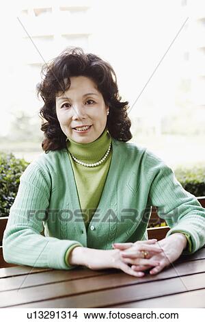Picture - Portrait of a mature woman smiling. Fotosearch