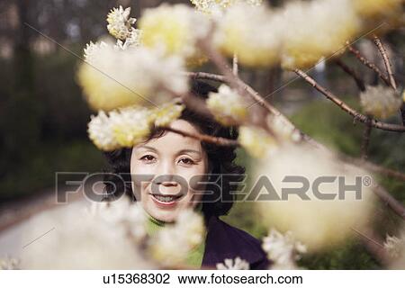 Stock Image - Portrait of a mature woman smiling. Fotosearch