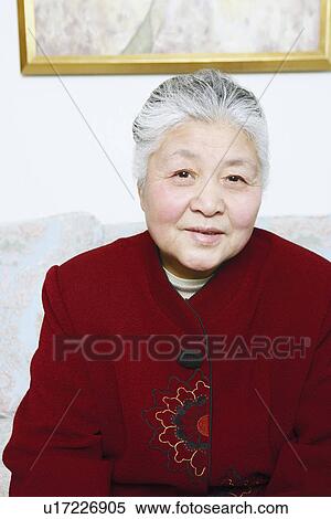 Stock Photography - Portrait of a senior woman smiling. Fotosearch