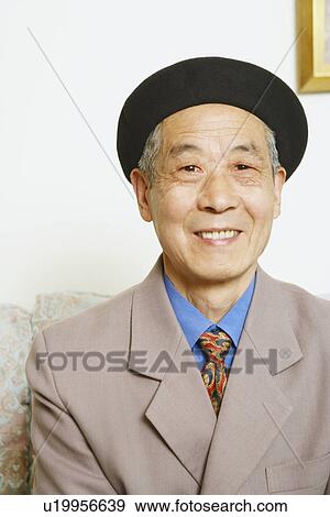 Portrait of a senior man smiling View Large Photo Image Stock Photo - Portrait of a senior man smiling. Fotosearch