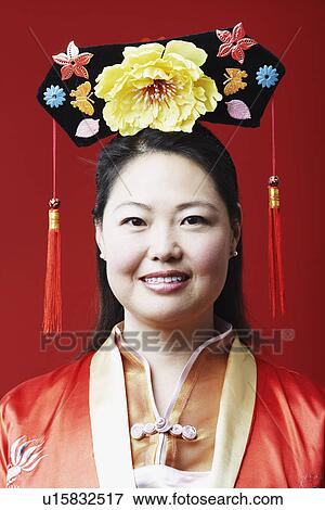 Stock Photo - Portrait of a mid adult woman smiling. Fotosearch