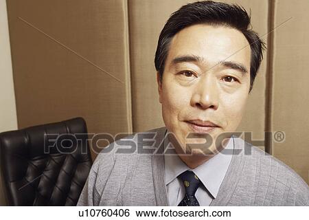 Portrait of a businessman View Large Photo Image Stock Photograph - Portrait of a businessman. Fotosearch