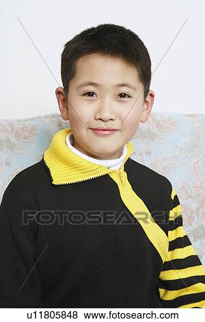 Portrait of a boy smiling View Large Photo Image Stock Photo - Portrait of a boy smiling. Fotosearch