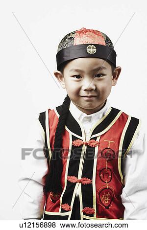 Stock Photo - Portrait of a boy smiling. Fotosearch