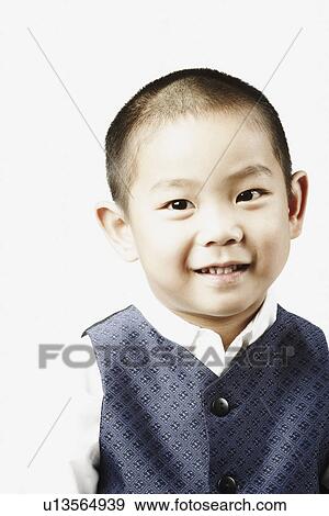 Portrait of a boy smiling View Large Photo Image Stock Photo - Portrait of a boy smiling. Fotosearch