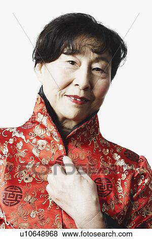 Stock Photo - Portrait of a mature woman smiling. Fotosearch