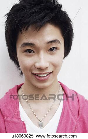 Portrait of a teenage boy smiling View Large Photo Image Stock Photography - Portrait of a teenage boy smiling. Fotosearch