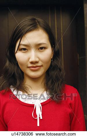 Portrait of a young woman View Large Photo Image Stock Photograph - Portrait of a young woman. Fotosearch