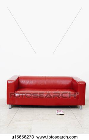 Stock Image - Couch on the floor. Fotosearch