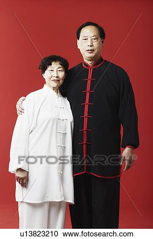 Stock Image - Portrait of a mature couple standing. Fotosearch