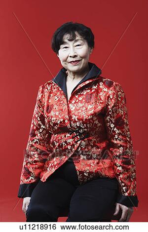 Stock Photograph - Portrait of a mature woman smiling. Fotosearch