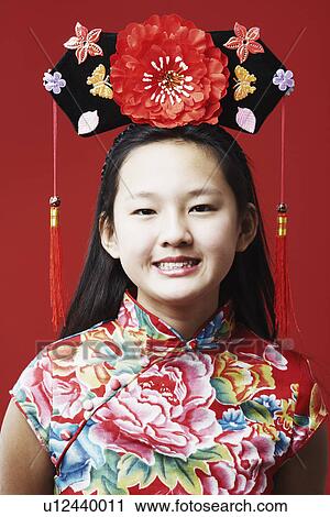 Stock Image - Portrait of a teenage girl smiling. Fotosearch