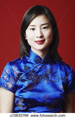 Portrait of a young woman smiling View Large Photo Image Stock Photograph - Portrait of a young woman smiling. Fotosearch