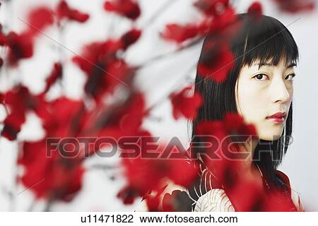 Stock Image - Portrait of a young woman. Fotosearch