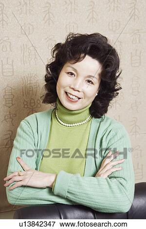 Portrait of a businesswoman smiling View Large Photo Image Stock Photo - Portrait of a businesswoman smiling. Fotosearch