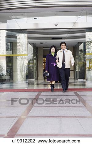 Stock Image - Portrait of a mature couple smiling. Fotosearch