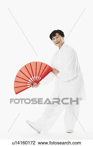 Portrait of a mature woman dancing View Large Photo Image Stock Image - Portrait of a mature woman dancing. Fotosearch
