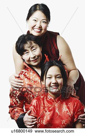 Stock Photo - Portrait of a mother with her daughter and granddaughter. Fotosearch